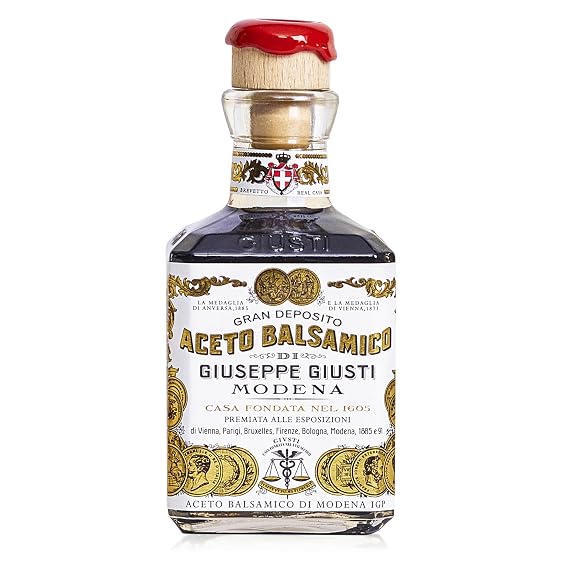 Giusti 2 Gold Medals Balsamic Vinegar of Modena IGP - 8.45 fl oz | Notes of ripe fruit, licorice, and black pepper. Balanced flavor for pasta, cheese, or cocktails. Matured in oak barrels.